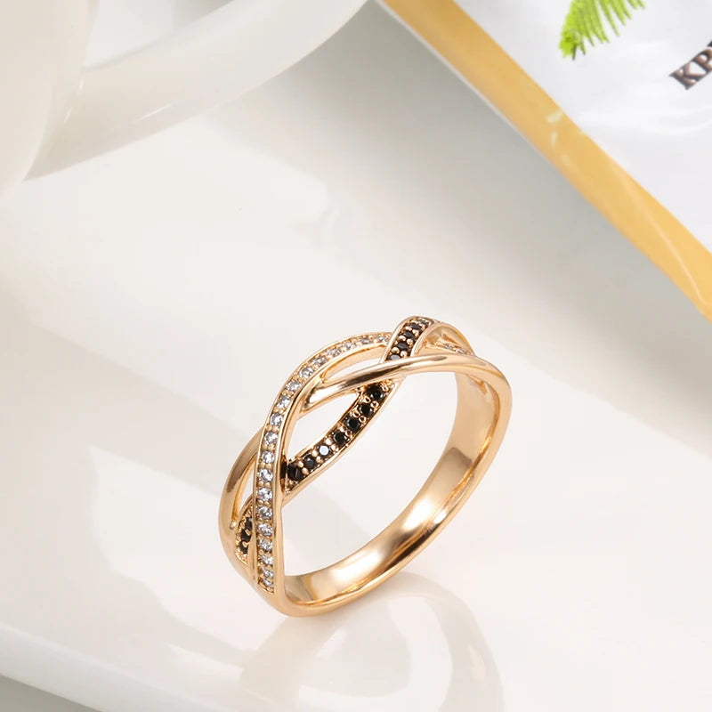 The Nova Ring – Rose Gold Twist with Natural Zircon