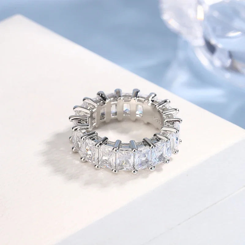 The Lumière Ring – Emerald-Cut Eternity Band in 925 Silver
