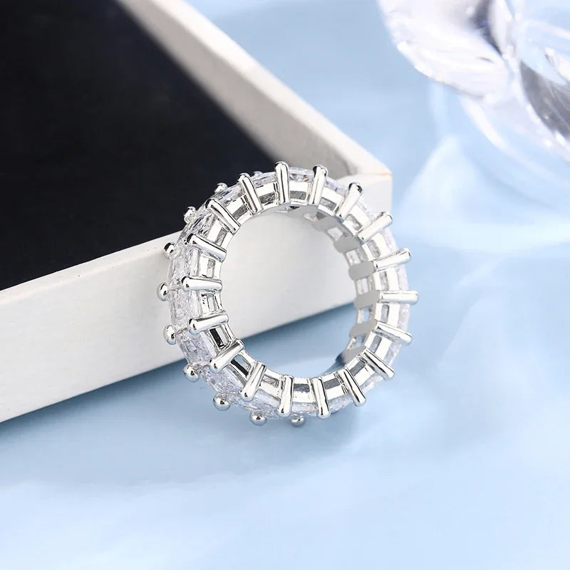 The Lumière Ring – Emerald-Cut Eternity Band in 925 Silver