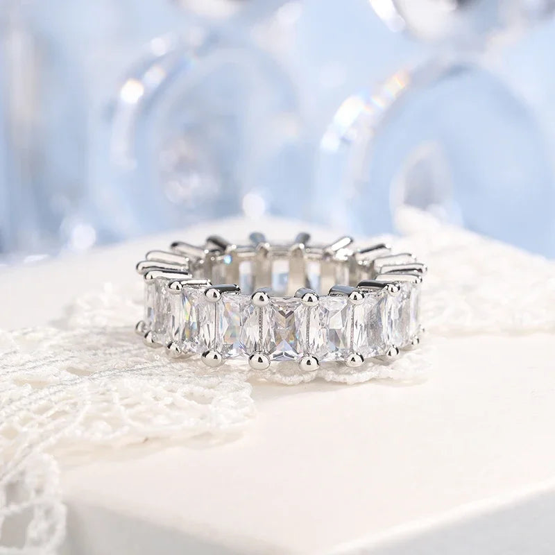 The Lumière Ring – Emerald-Cut Eternity Band in 925 Silver